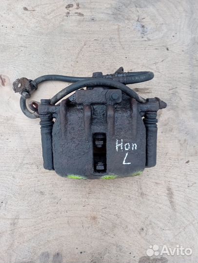 Суппорт тормозной передний левый Honda Civic 6