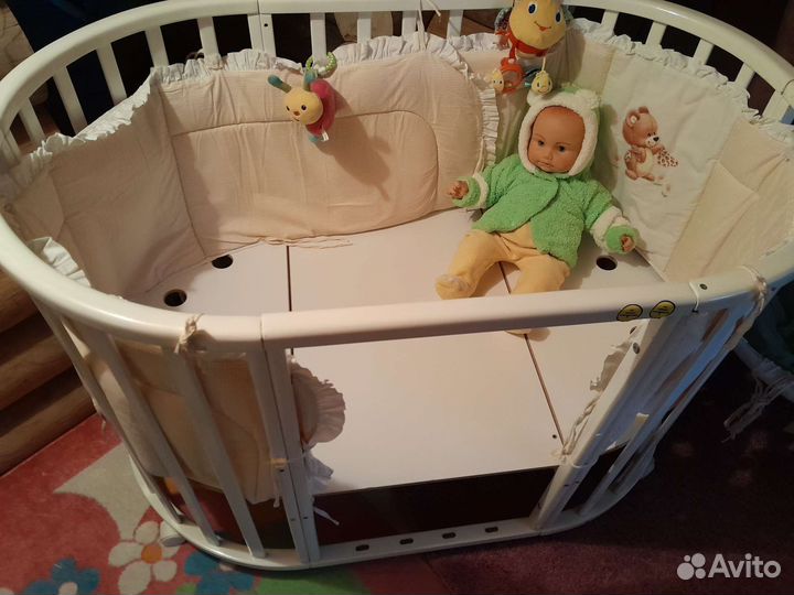 Детская кроватка трансформер овальная на колёсах