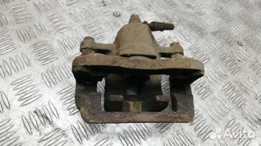 Суппорт тормозной задний левый KIA magentis MG (KE