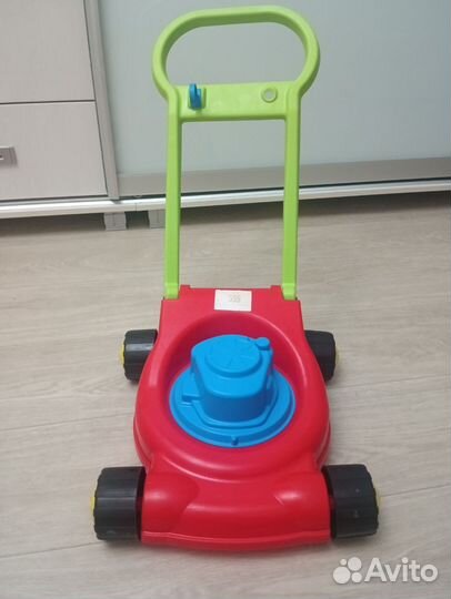 Игрушка газонокосилка