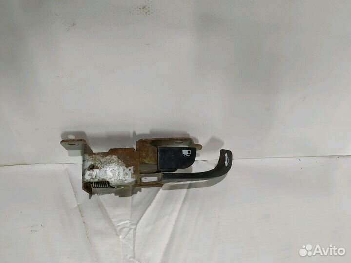 Kia Spectra ручка открывания багажника