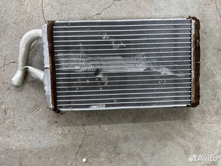 Радиатор печки на Lancer Cedia