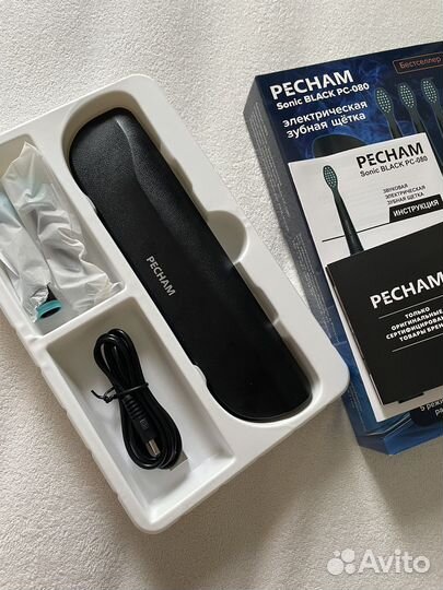 Электрическая зубная щетка