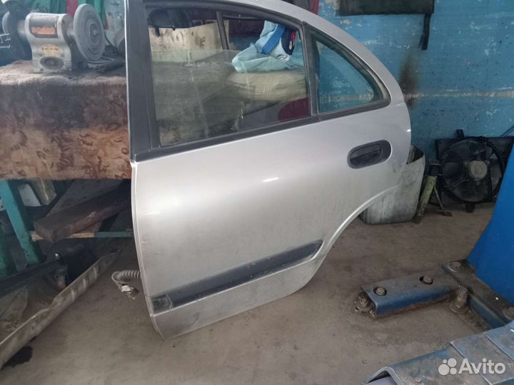 Дверь задняя левая Nissan Almera N16 b10