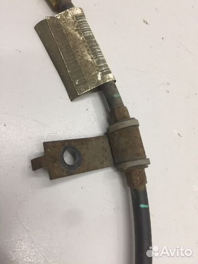 Трос стояночного тормоза левый (Jaguar XJ)