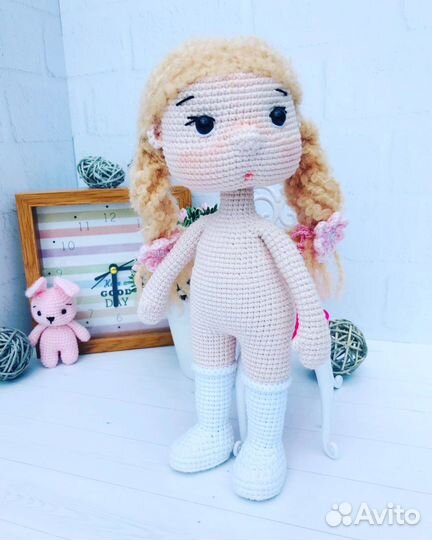 Куколка в костюме зайчика