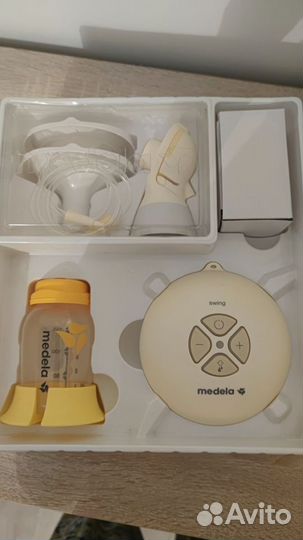 Молокоотсос электрический новый Medela swing flex