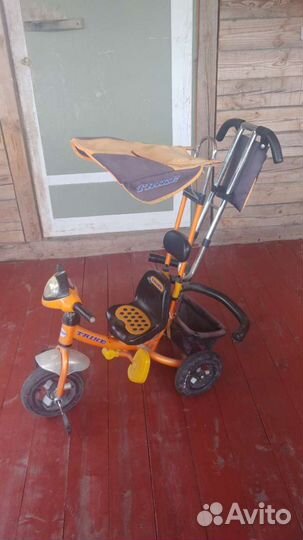 Детский велосипед с ручкой