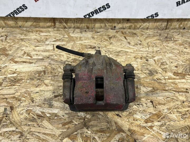 Суппорт тормозной перед правый Hyundai Elantra XD