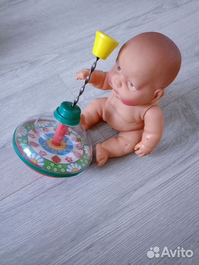 Пупс с юлой