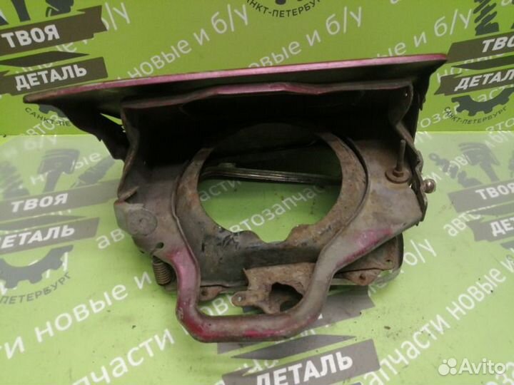 Кронштейн фары левый Mazda 323 BG хетчбек 1.6 B6