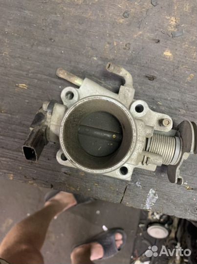 Дроссельная заслонка Mazda Demio