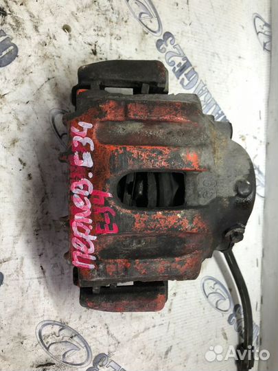 Суппорт bmw e 34 передний