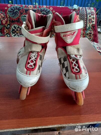Роликовые коньки