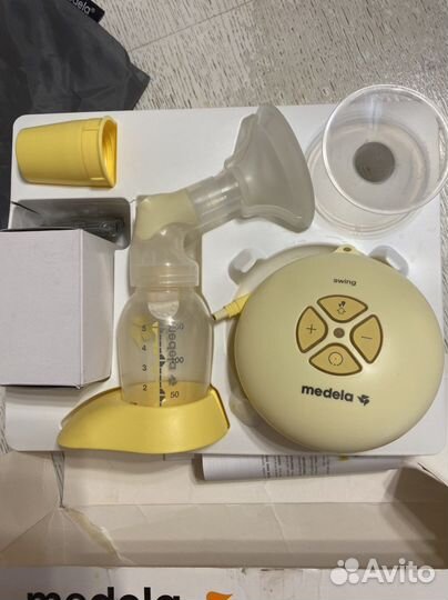 Молокоотсос medela swing электрический