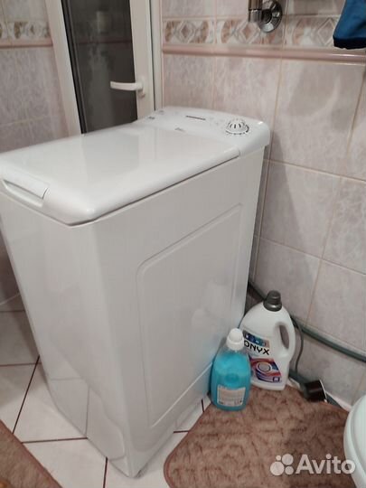 Стиральная машинка с вертикальной загрузкой Candy