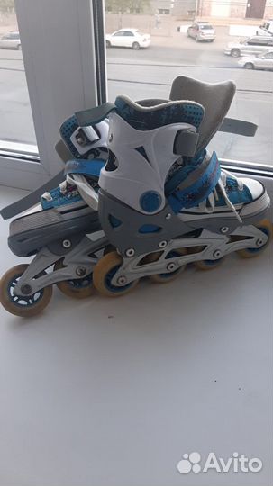 Роликовые коньки