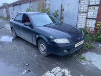 Mazda 323 1.6 AT, 2003, 380 000 км, с пробегом, цена 139 000 руб.