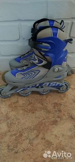 Роликовые коньки