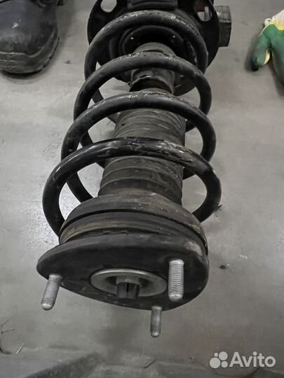 Стойка амортизатора Мазда сх-5 кф