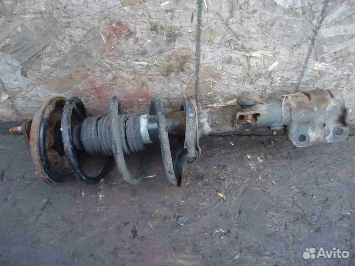 Амортизатор передний L Mitsubishi Outlander XL