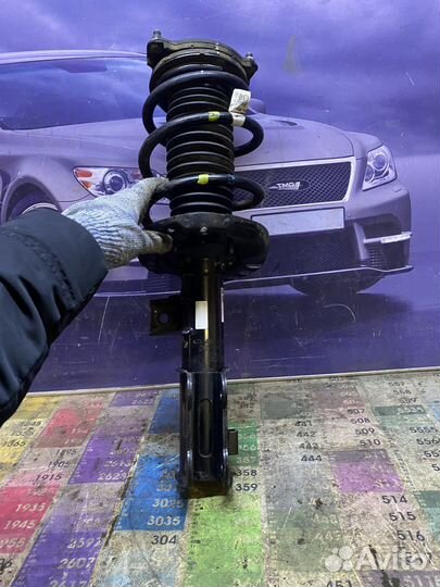 Стойка амортизатора передняя левая KIA K5