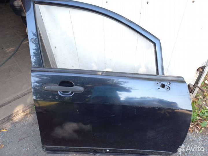 Правая перед.дверь на сузуки лиана