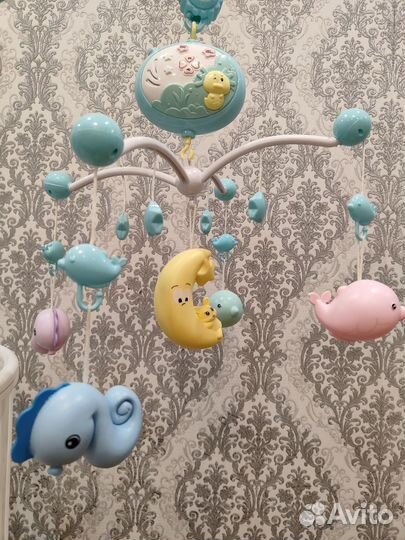 Детский мобиль в кроватку музыкальный