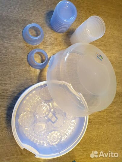 Молокоотсос, стерилизатор, контейнеры Avent
