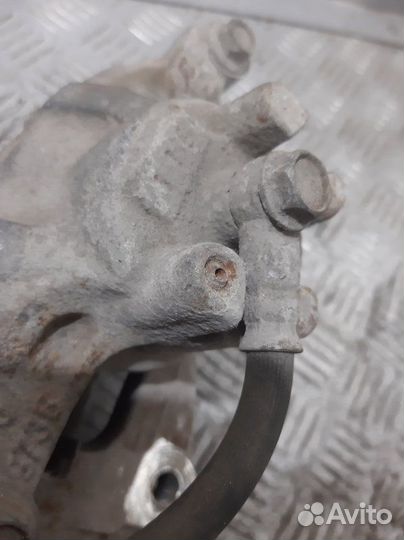 Суппорт передний левый Mitsubishi Lancer CY 4A91