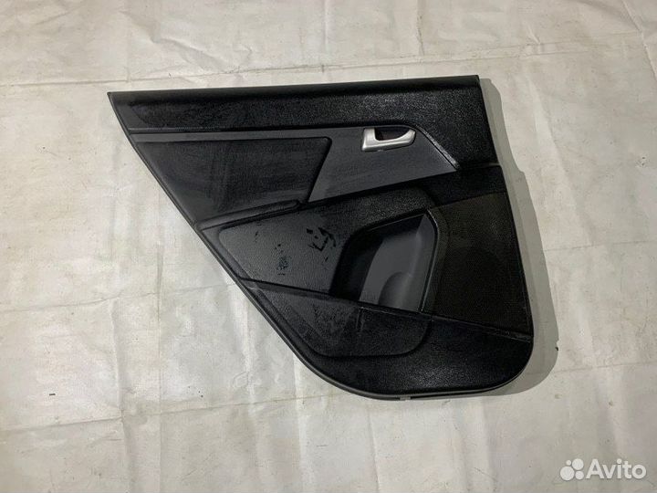 Обшивка двери задняя левая Kia Sportage 3 SL