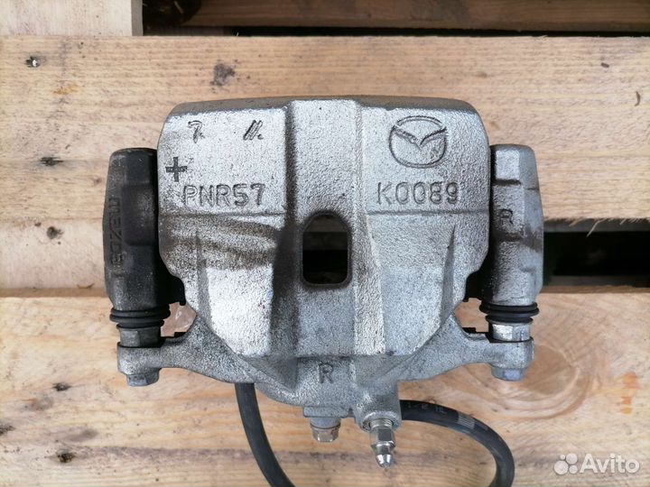 Передний тормозной суппорт мазда 6 GJ