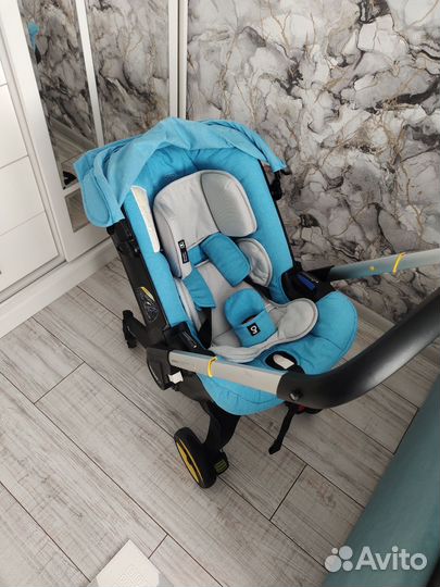 Коляска автокресло doona с базой isofix