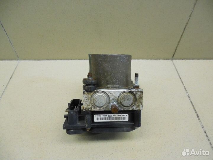 Блок ABS (насос) Almera N16 2000-2006