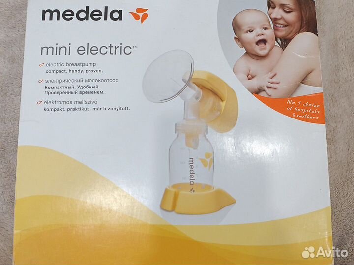 Молокоотсос medela mini electric