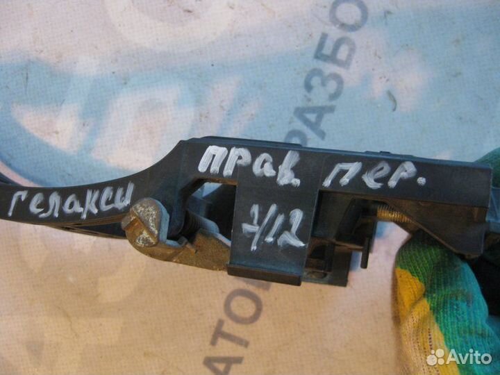 Кронштейн ручки (наружняя) передний правый Ford