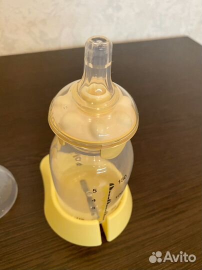 Молокоотсос medela ручной и стерилизатор Avent