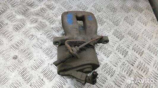 Суппорт тормозной задний левый volkswagen passat B