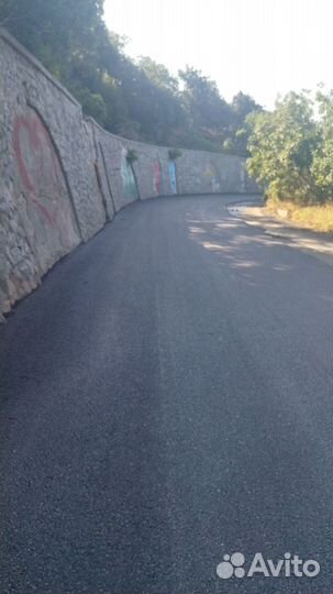 Укладка асфальта. асфальтная крошка