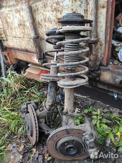 Амортизатор правый всборе пежо партнер 2008г