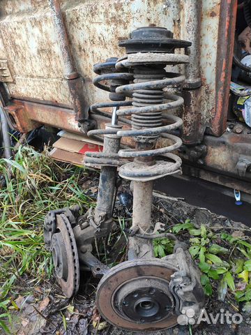 Амортизатор правый всборе пежо партнер 2008г