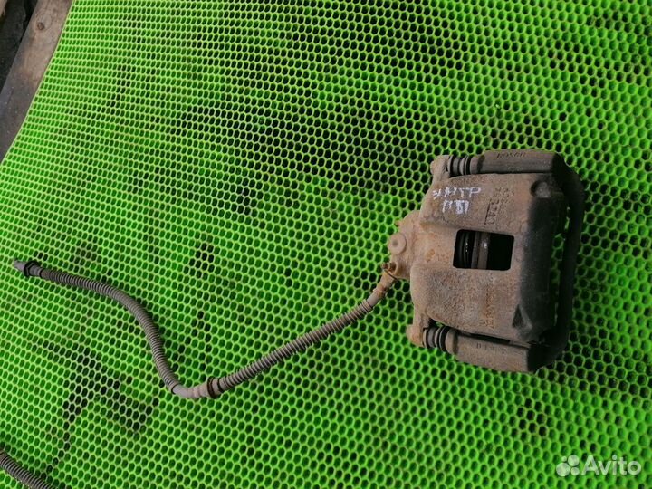 Суппорт передний на Geely Emgrand EC7 11-16