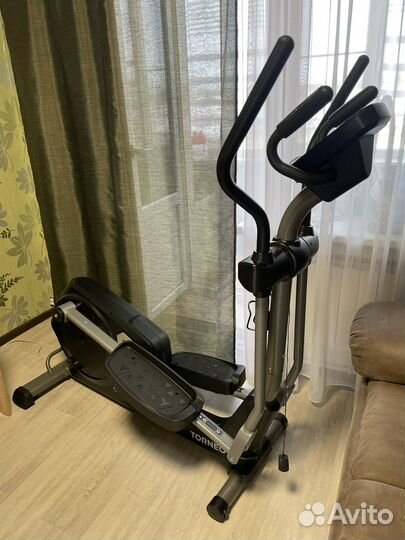 Эллиптический тренажер torneo