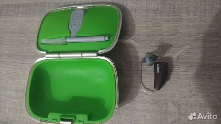 Заушный почти не видимый слуховой аппарат