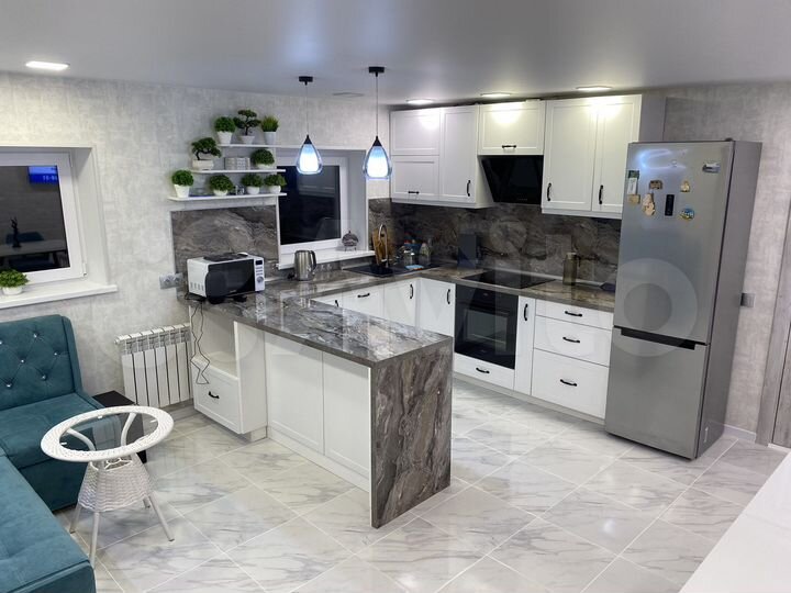 Дом 107 м² на участке 5,5 сот.