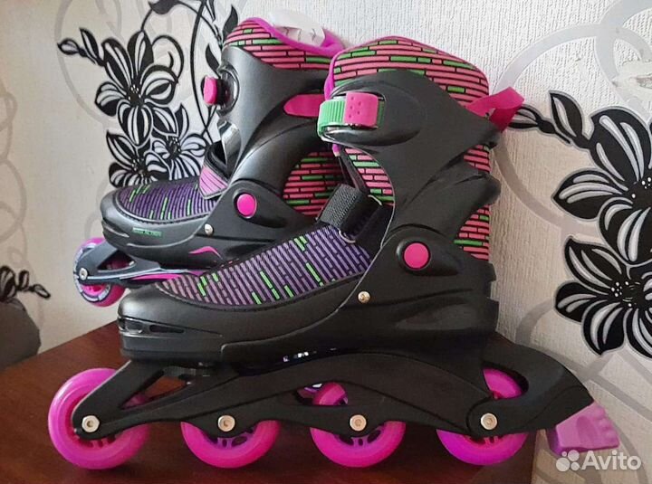 Роликовые коньки