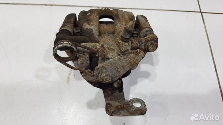 Суппорт задний левый (Geely Emgrand X7)