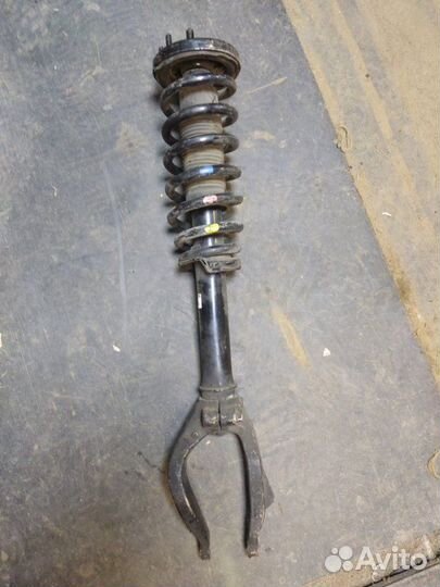 Стойка амортизатора передняя правая Honda Accord 7