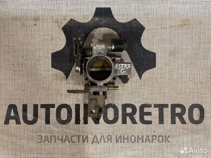 Дроссельная заслонка Opel 90529710