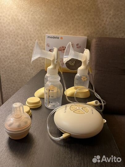 Молокотсос Medela maxi swing двойной в наборе